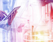 image of a doctor using a tablet and microsope