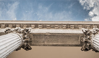 image of courthouse columns against the sky