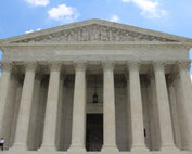 image of the facade of a traditional courthouse with columns