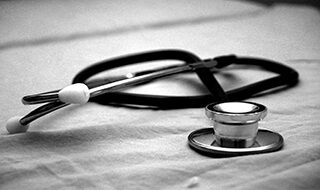 black and white image of a stethoscope