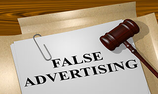 Court documents with a paper that reads "FALSE ADVERTISING"