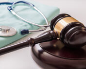 A gavel and stethoscope