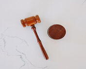 judge's gavel on marble backdrop