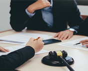 a group of attorneys at a table