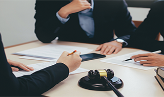 a group of attorneys at a table