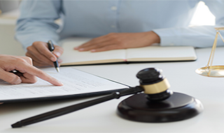 attorney at desk with client tvm