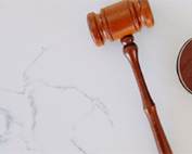 a gavel on a marble table